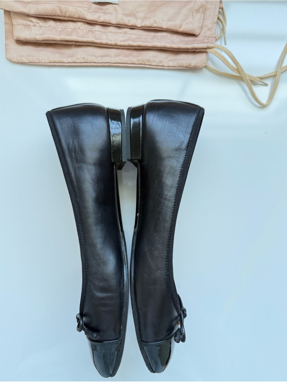 Prada Black Leather Ballet Flats with Patent Cap Toe and Bow - Picture 5 of 5